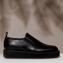 Black leather platform slip on shoe