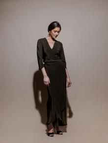 Model wearing long black dress